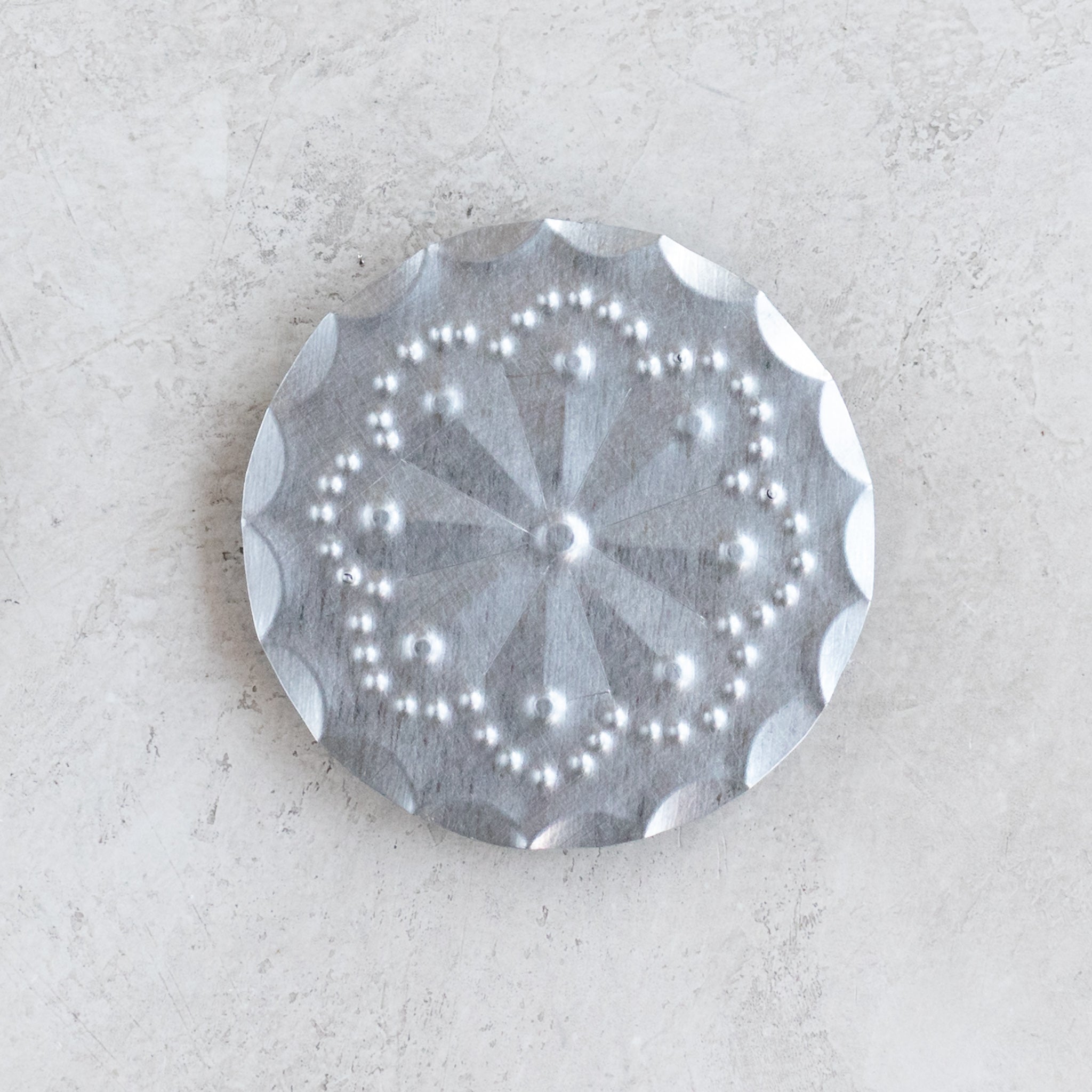 Front view of the Accent Roseta Pin with 2.25-inch tin rosette, magnetic back version.