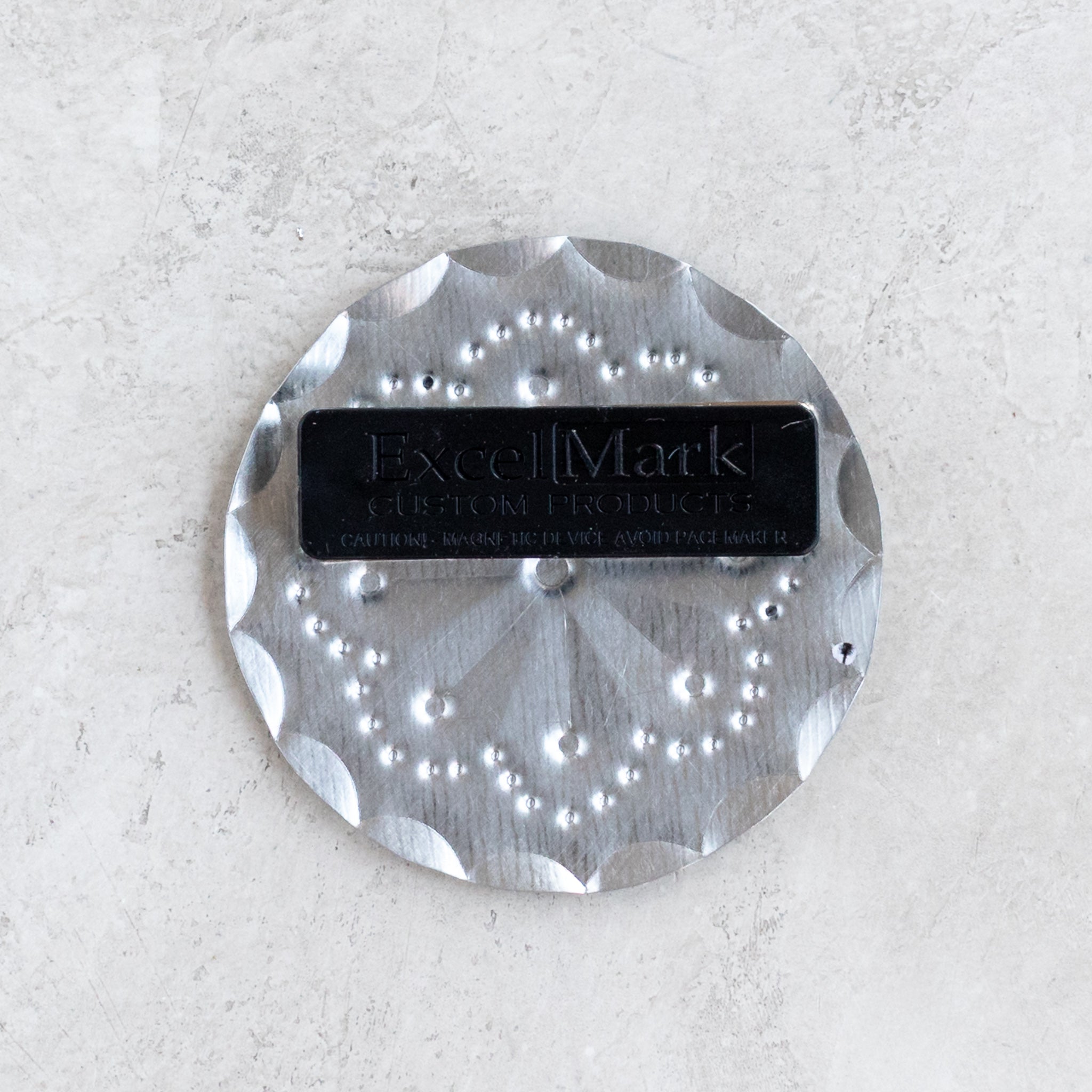 Back view showing the magnetic clasp of the 2.25-inch Accent Roseta Pin.