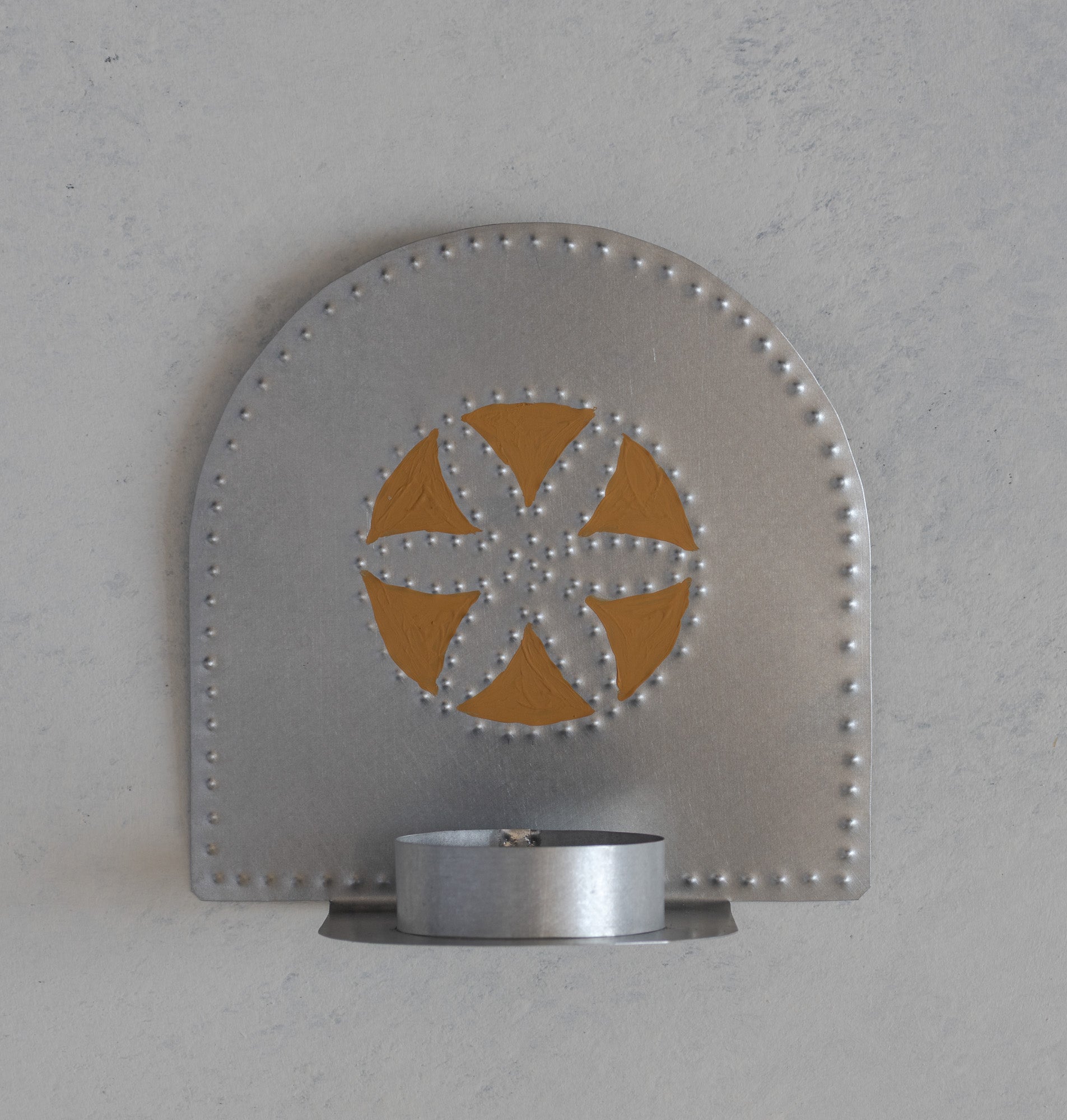 Hand punched tin flor tealight candleholder with Ochre hand painted detail, handmade in Santa Fe