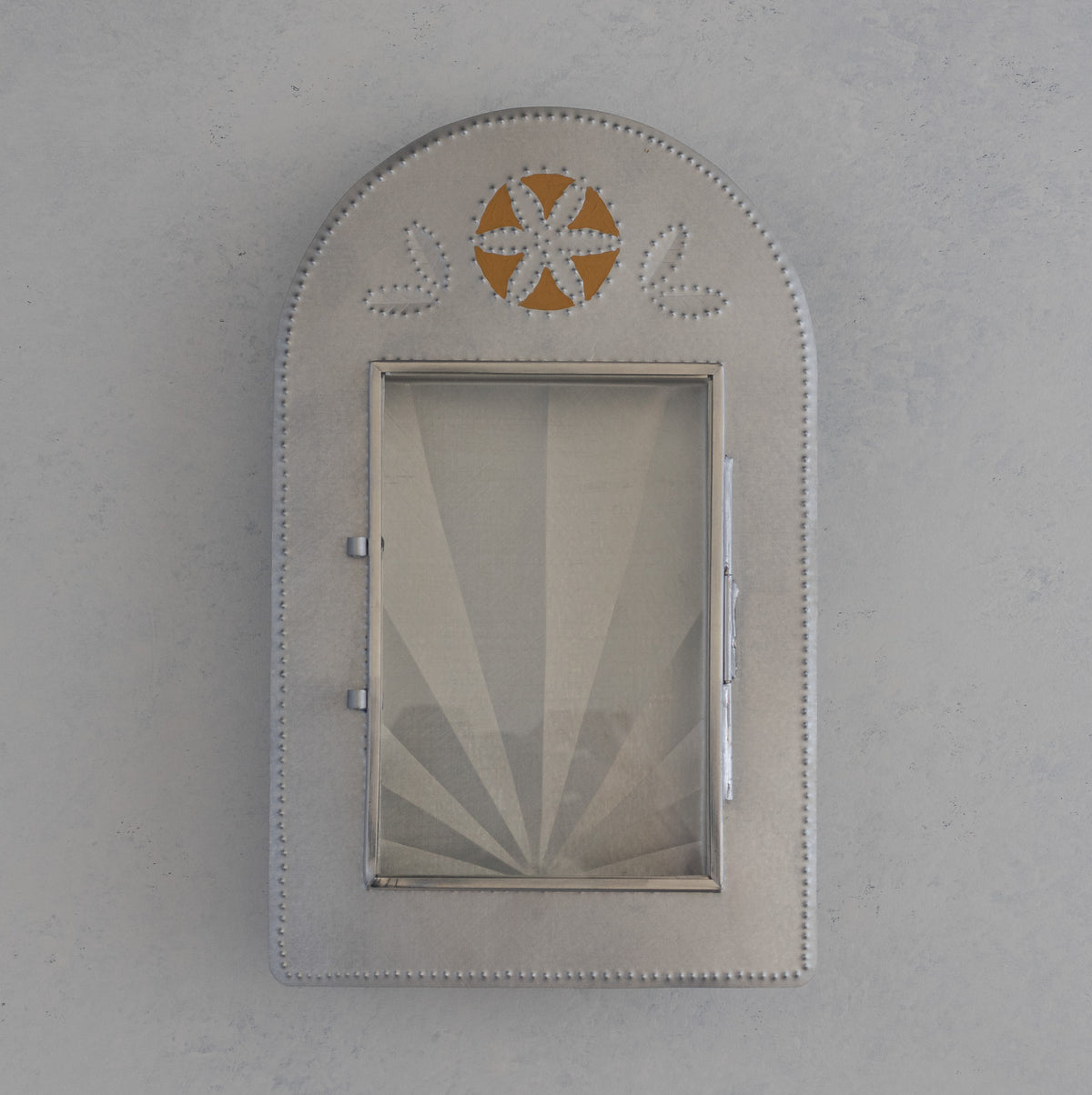 Hand punched tin Nicho de Recuerdo with ochre painted rosette detail and glass door, handmade in Santa Fe